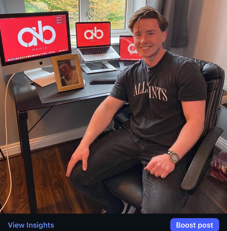 Alex launching A2B from his home office, with his dad's photo on the desk